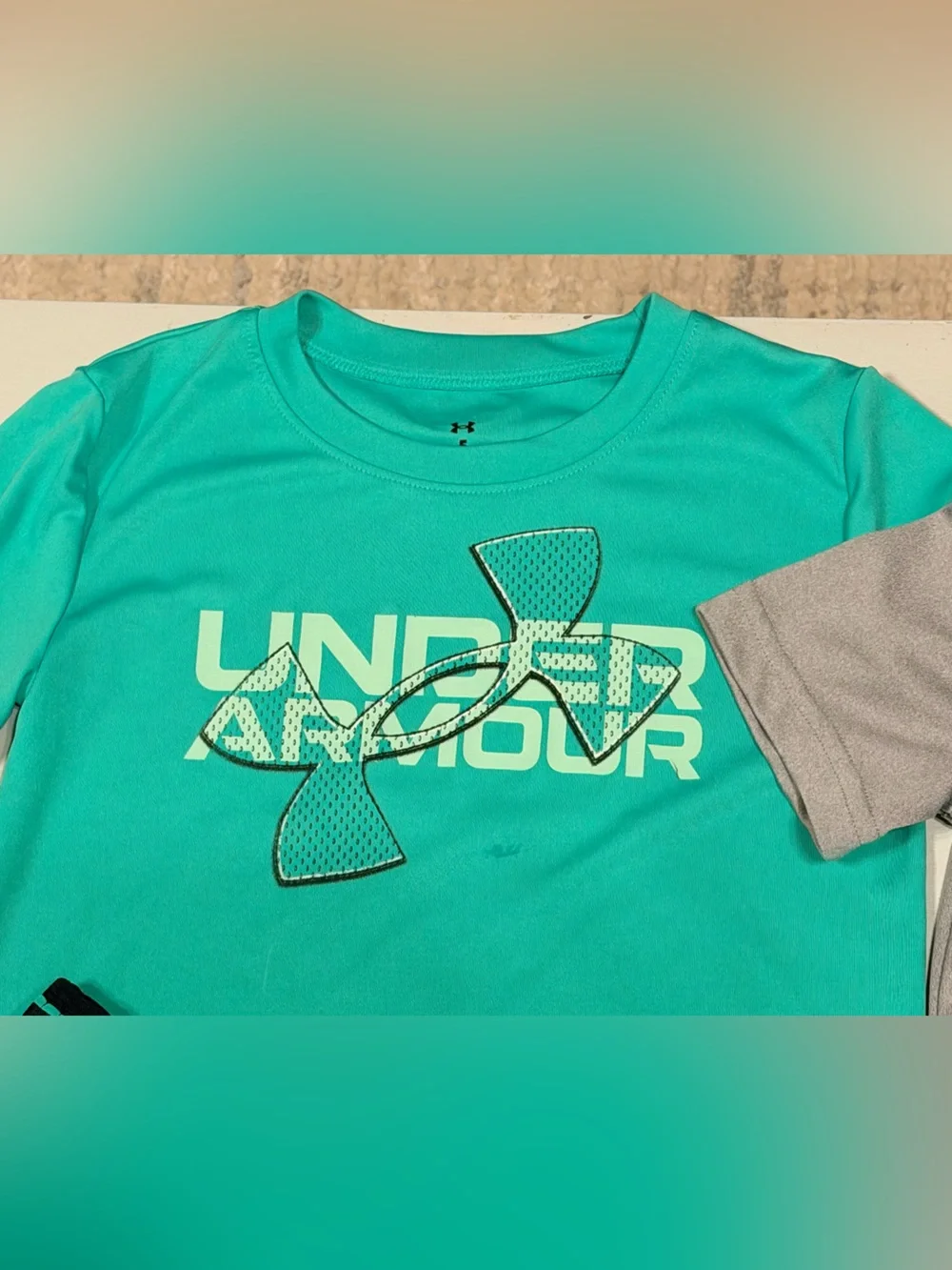 Under Armour Boys' Teal Performance Short Set and 1 polo and 1 performance tee. - Picture 2 of 4